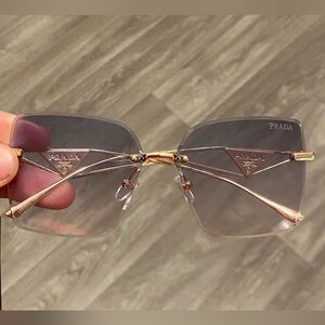 Prada Gold and Gray Sunglasses Sleek Gradient Lenses